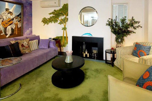 装饰亮点:绿色地毯(地毯装修效果图)和同色系布艺沙发构成了一个春天