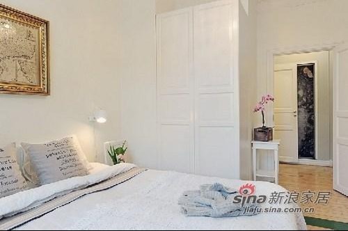简约 公寓 卧室图片来自用户2739153147在87平方流行与古典混搭小公寓53的分享