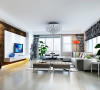 客厅色调靓丽清新，黑白色调的实用，使得整个空间充满艺术气息和浪漫感