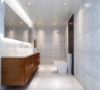 卫生间以灰白色为主，主要是让人看上去干净舒适。墙地面一色的砖，镜面很好的拉伸了空间感。