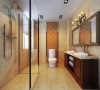 卫生间属于长条形的，墙面拼花复古风砖配上典雅的镜子，整个卫生间很是赶紧舒适。淋浴区单独分开，保证了干湿区分。