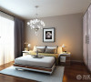 次卧室采用的也是简单大方的家具，整体颜色也是浅咖色乳胶漆。