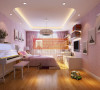 儿童房设计：为粉红色为主色调，简单清新的书桌，尽显儿童房的清新自然。