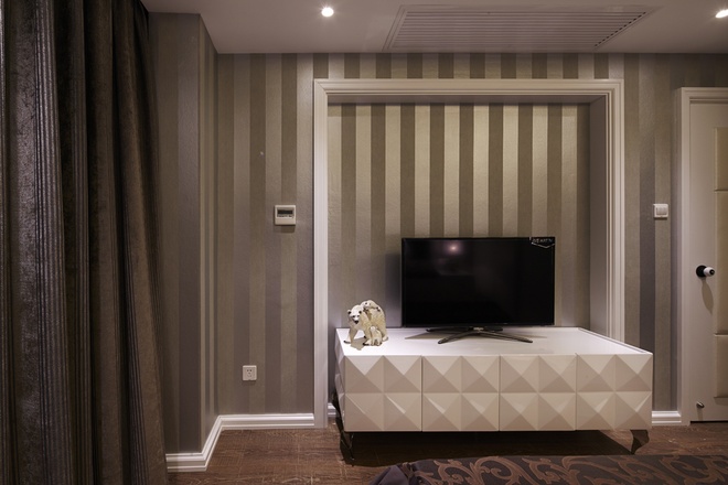 卧室图片来自家装大管家在后现代欧式风格 110平低调华丽居的分享