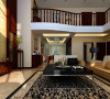 客厅空间红木色的楼梯，原木色的沙发加上现代感十足的茶几，让古典中式和现代简约风格完美的结合。