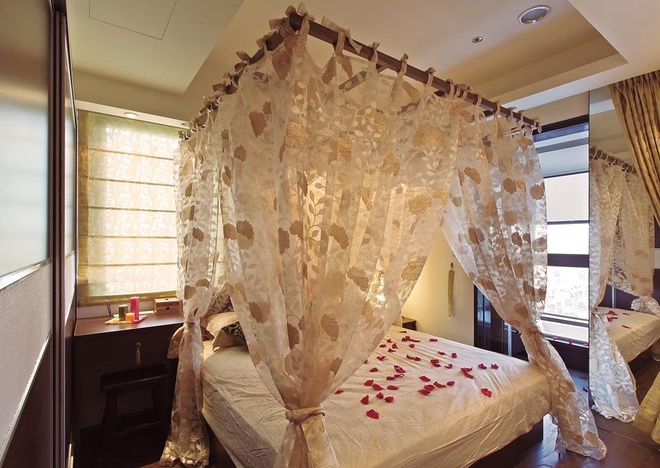 卧室图片来自家装大管家在浪漫巴里岛 67平异国风情两居室的分享