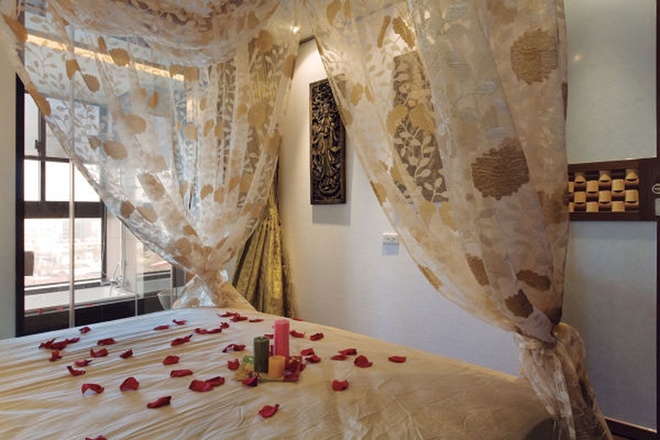 卧室图片来自家装大管家在浪漫巴里岛 67平异国风情两居室的分享