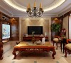 客厅作为待客区域， 力求明快光鲜，材质主要以石材和木饰面做装饰地砖采用仿古砖是整个客厅达到宽敞而富有历史气息。