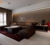 力求设计基调的平衡性，选择有手工肌理的马来漆为沙发主墙，以及仿石材的消光砖为地坪。