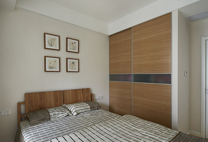 日式风格 原木设计 环保设计 三口之家 三居 卧室图片来自上海实创-装修设计效果图在89平日式原木三室两厅温馨家的分享