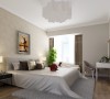 卧室以白色作为基础色，米白色的花纹作为背景，与浅色的地板相互呼应，一副简单的挂画都给人温馨浪漫的感觉。