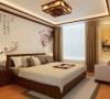 卧室是现代与中式元素的完美结合，中国传统的花鸟背景图，充分体现出中国传统美学精神。