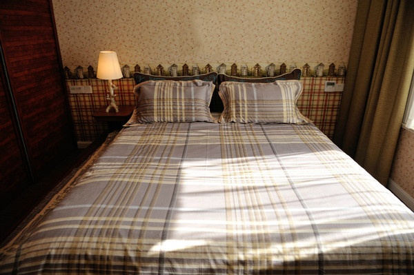卧室图片来自家装大管家在青苹果森林系 120平混搭风三居的分享