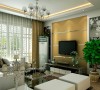 棕色铺贴并用白镜条做勾缝的电视背景墙，与白色的家具呼应，拉伸了视线。彰显现代风格的简约时尚。