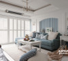 客厅以白色打底，浅蓝色为主基调色，突出了地中海风格，家具的搭配给人宁静的感觉