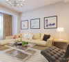 客厅选用淡色系沙发，电视背景墙选用深褐色乳胶漆，不锈钢条收边，极其简约大气。