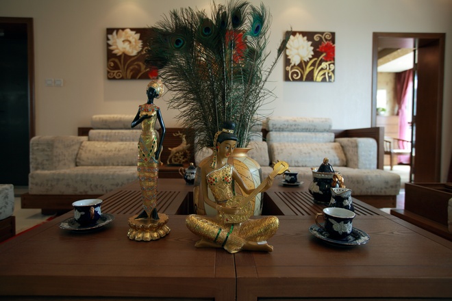 客厅图片来自家装大管家在迷人异域风情 112平东南亚风情居的分享