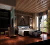 卧室运用木梁、泰式的一些典型配饰元
素把整个空间氛围体现得非常到位