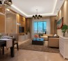 地面上铺的是米黄色的仿古砖，深色的家具搭配，使整体更加温馨有品质感。