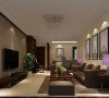 客厅，是体现整体风格最明显的区域，现代的沙发、中式的圈椅、中式的装饰挂画、一些中式的装饰品等。
