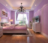 次卧室，是儿子的婚房，采用紫色浪漫的色彩风格