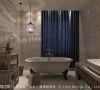 空间中构置一座独立式浴缸，铺述场域的大器辉煌，而吊灯光影摇曳，恣意地享受美好时光。