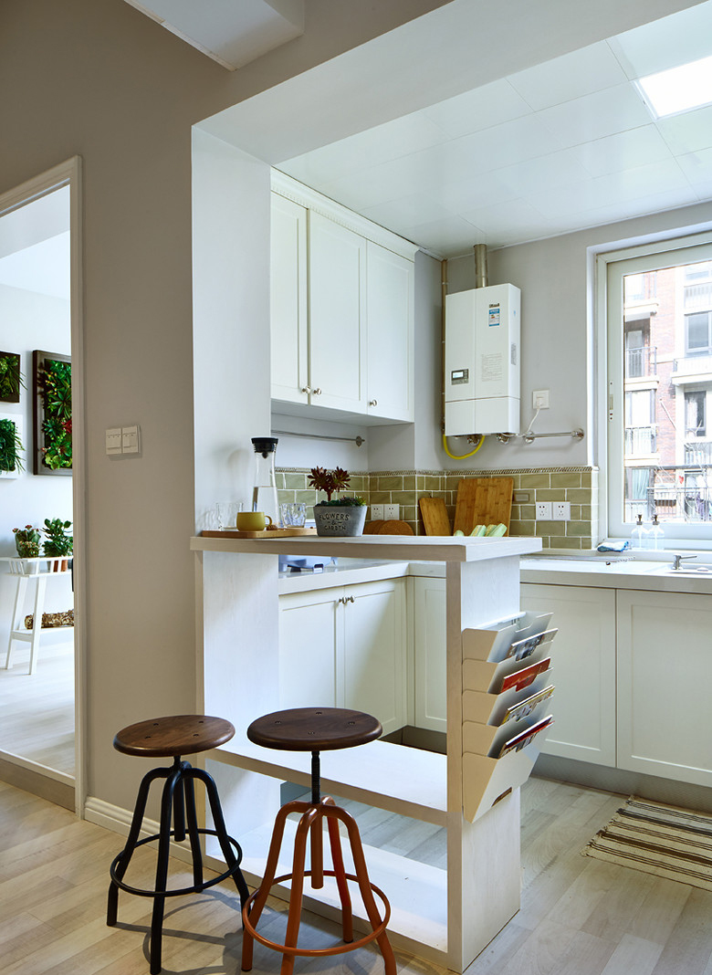 厨房图片来自家装大管家在白色简约经典 106平北欧温馨公寓的分享