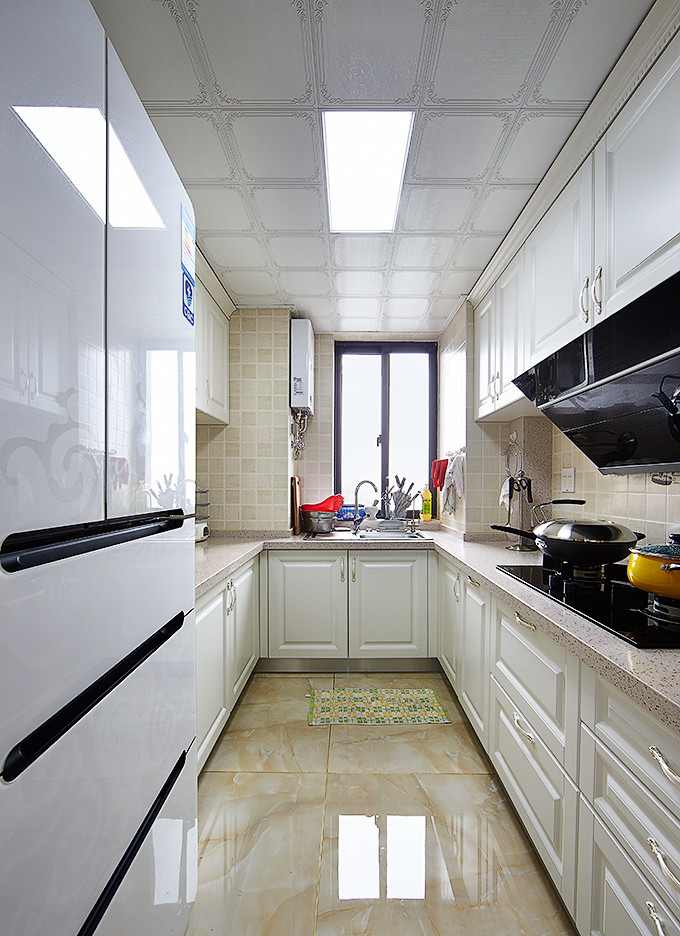 厨房图片来自家装大管家在法式浪漫四溢 139平舒适大气3居的分享