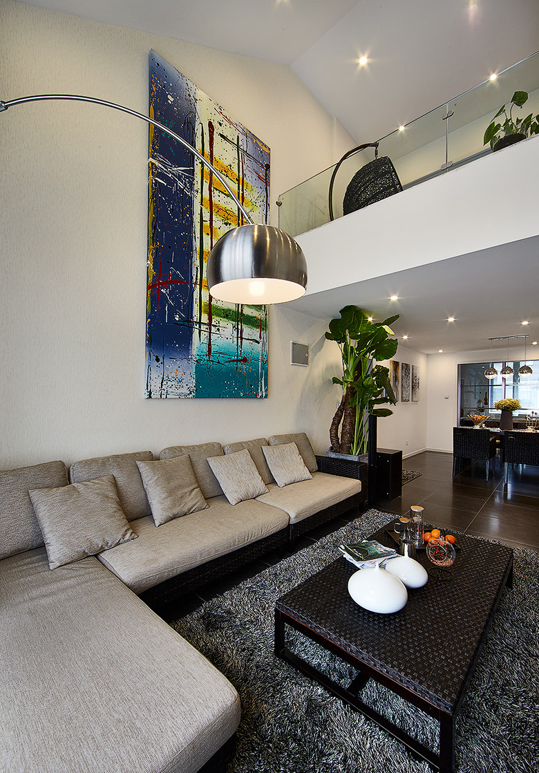 客厅图片来自家装大管家在现代舒适之家 150平港式前卫loft的分享