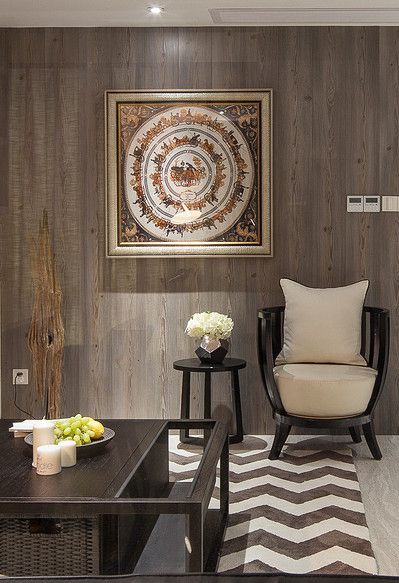 客厅图片来自家装大管家在145平现代时尚3居 黑色木色搭配的分享