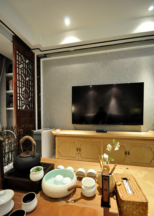 客厅图片来自家装大管家在89平新中式淡雅居 温馨时尚空间的分享