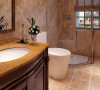 卫生间设计：
卫生间以干湿分区的形式来表现，配以实创整体家装中的卫浴产品——大理石台面、镶嵌式面盆，既方便了业主日后的使用功能，同时也增加了空间感