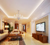 客厅设计：
设计理念：细腻的米黄色调，欧式涡卷纹样家具，咖啡色与米白色的搭配，让优雅的格调呼之欲出。