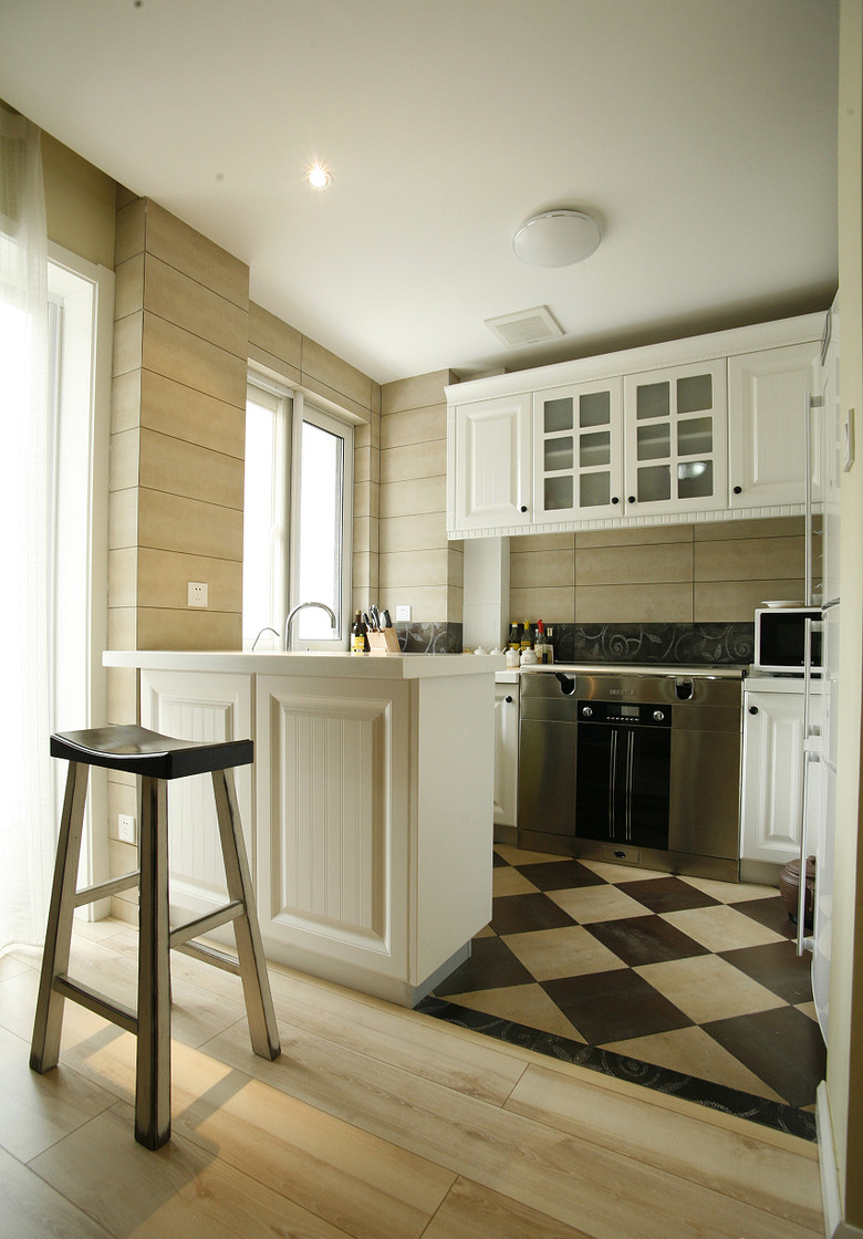 厨房图片来自家装大管家在120平现代舒适3居 混搭筑爱巢的分享