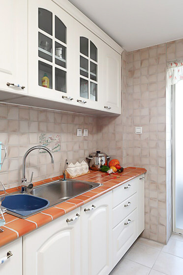 厨房图片来自四川岚庭装饰工程有限公司在80平温馨质朴地中海风格装修的分享