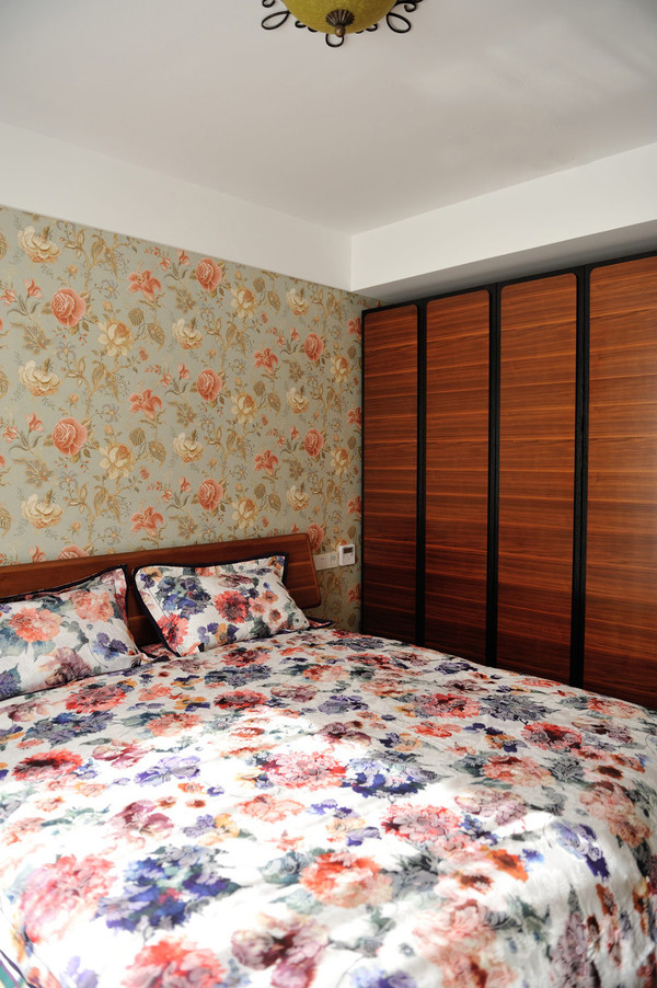 卧室图片来自四川岚庭装饰工程有限公司在120平混搭风三居的分享