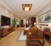 客厅整体设计效果，中式风格的迷人之处在于他的大气稳重和贴近自然，中式风格的家居透出浓郁的文化气息。