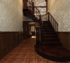 美式风格装修一定要显得大气稳重、美式家具多以深棕色为主，大面积的实木装饰让整个家显的更贴近自然，这里是美式装修风格中的一层楼梯入口，整个楼梯走廊墙面用壁纸做装饰。