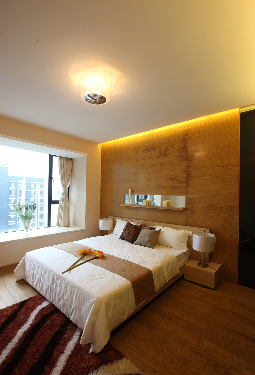 简约 三居 卧室图片来自四川建拓建筑装饰工程有限公司在现代简约——享受的分享