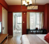 整个卧室窗明几净，十分通透开阔。黑白红三色搭配，简约摩登。