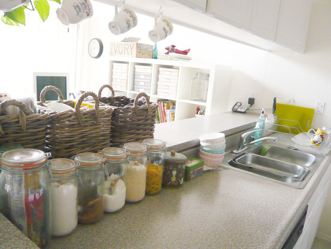 厨房图片来自四川岚庭装饰工程有限公司在整齐收纳 69平开放式小公寓的分享