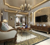 客厅顶面的造型采用的是内圈金线，顶面贴金箔，透露出奢华的气息，