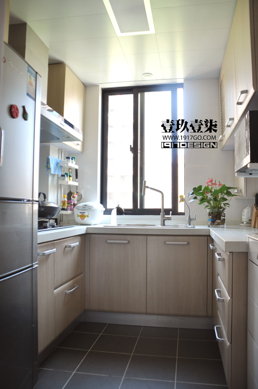 厨房图片来自四川岚庭装饰工程有限公司在梦光年—98平现代简约一居的分享
