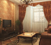 客厅设计：
电视背景墙采用软包与石材相结合的搭配突出现代感