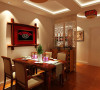 中式风格餐厅	设计理念：灯光家具配饰整体的色调映衬出幽静的就餐环境。
亮点：餐桌上的装饰画起到画龙点睛的作用。