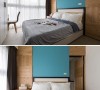 爽朗的天蓝色作为床头背墙，并以对称手法将卫浴的门片纳入整体立面设计。