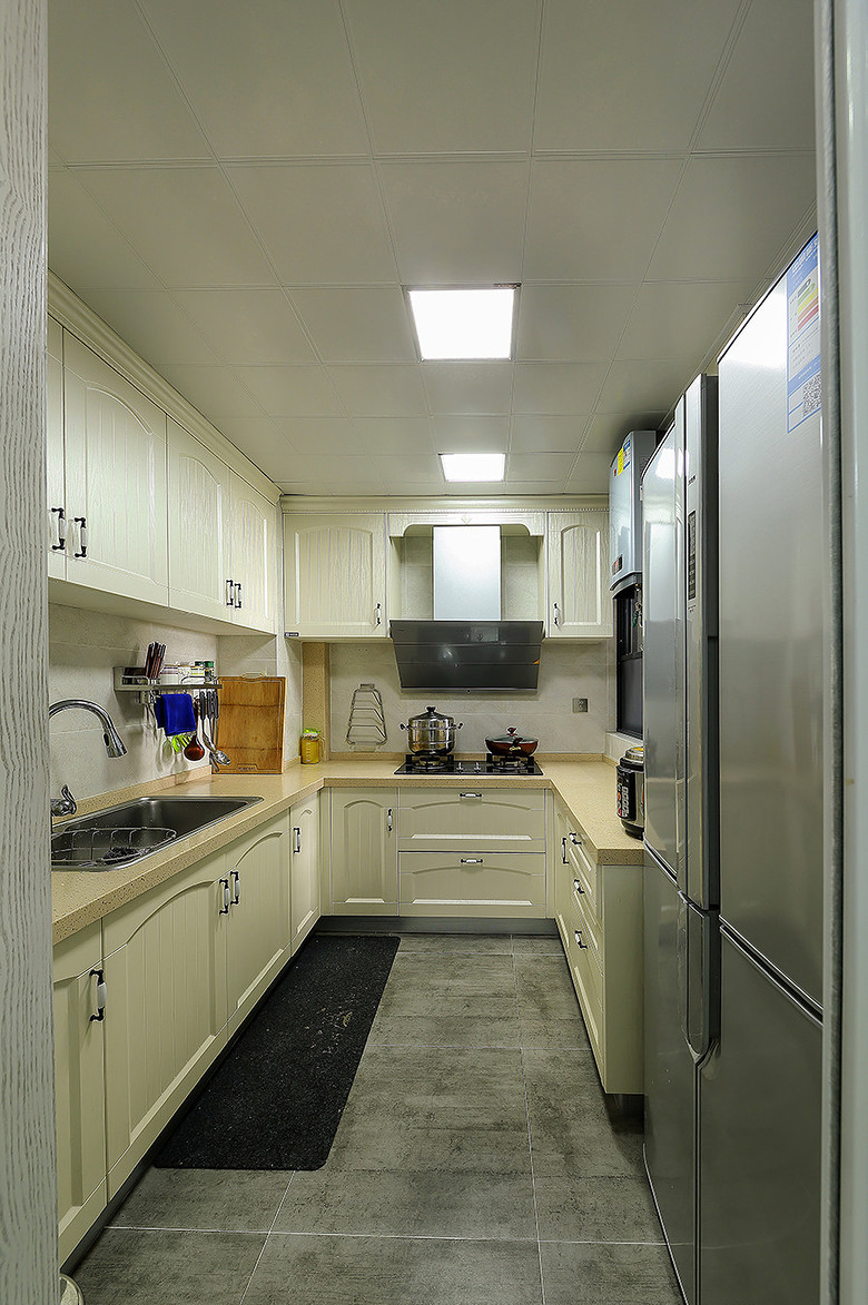 厨房图片来自家装大管家在简约清爽风 85平美式淡雅空间的分享
