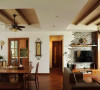吊顶的木梁设计、柚木色的家具、藤编元素都是东南亚风格的特点。