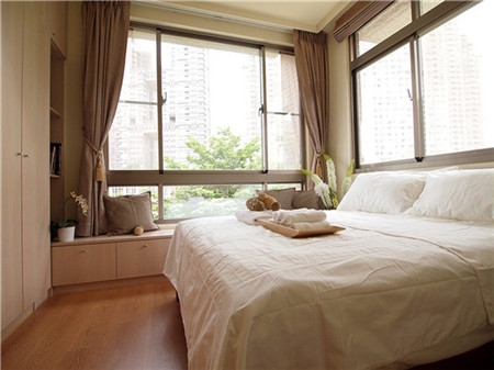 二居 80后 卧室图片来自上海潮心装潢设计有限公司在82平重叠的小空间家居设计的分享
