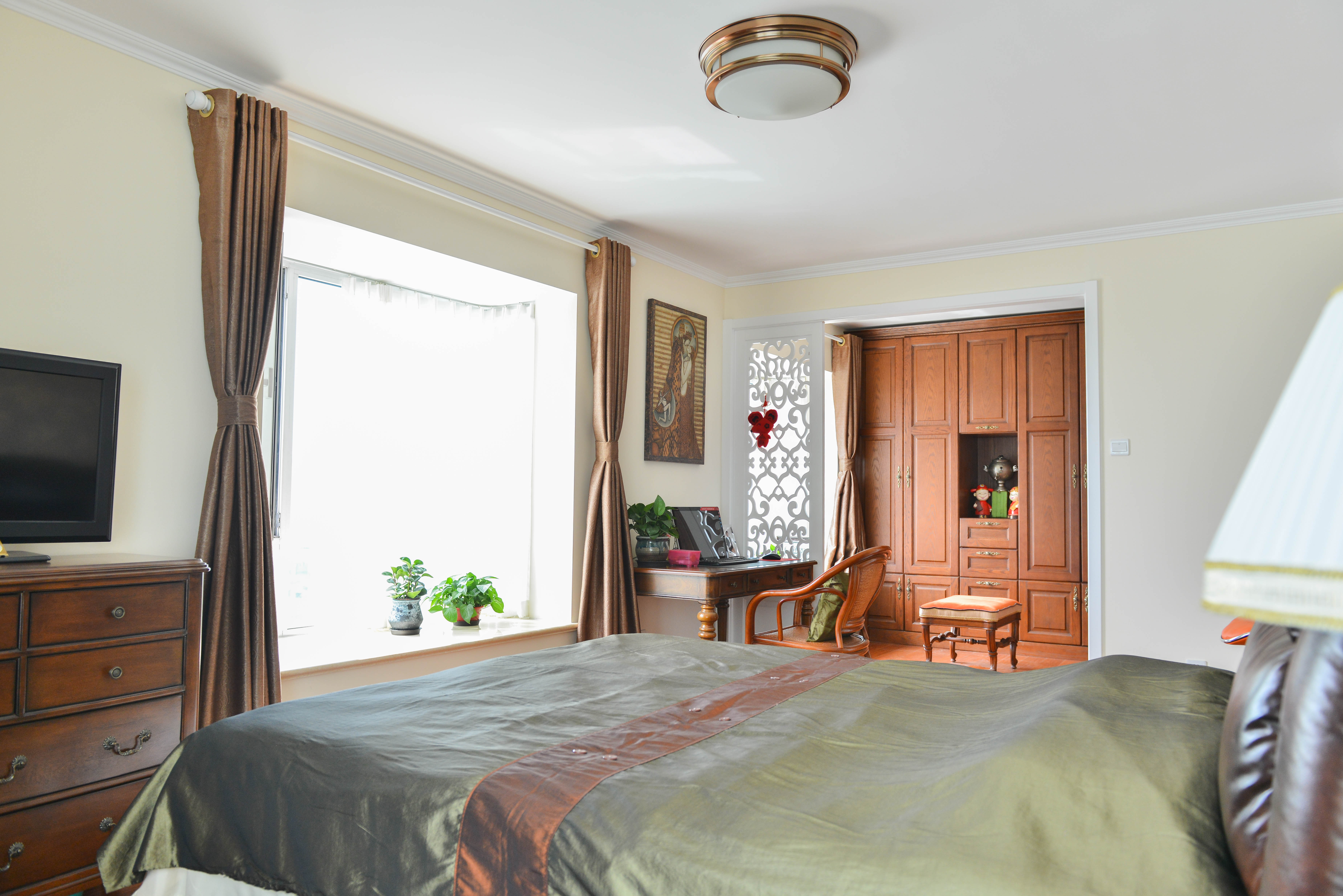 卧室图片来自今朝装饰张智慧在176平简约美式风格的分享
